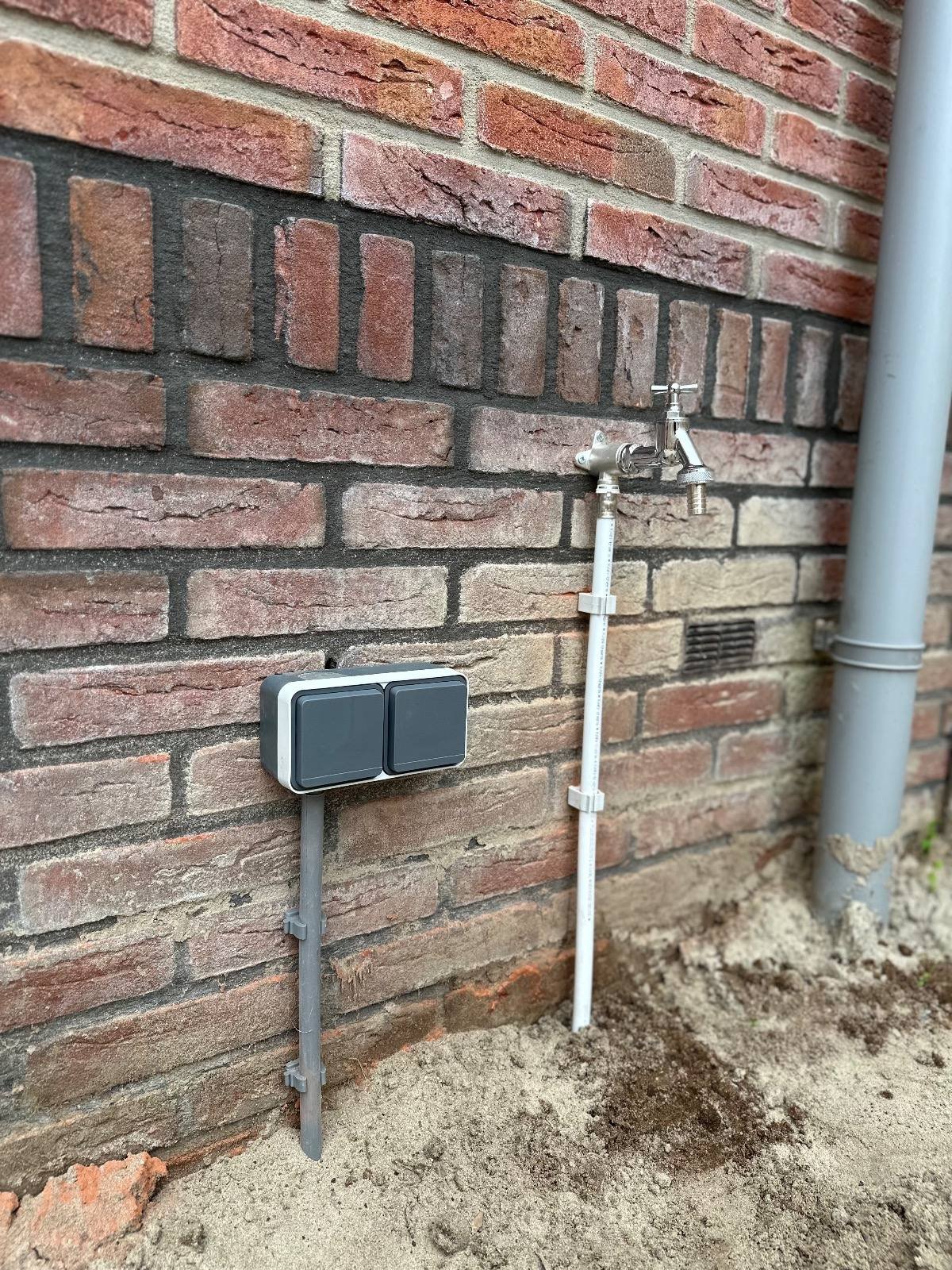 Buitenkraan aan de gevel